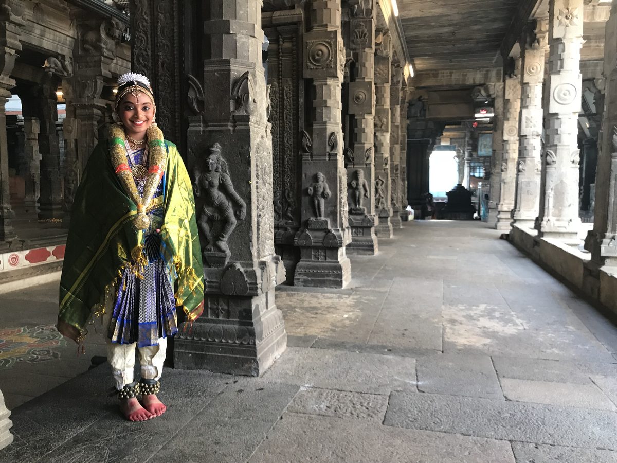 Shriya in a temple corridor